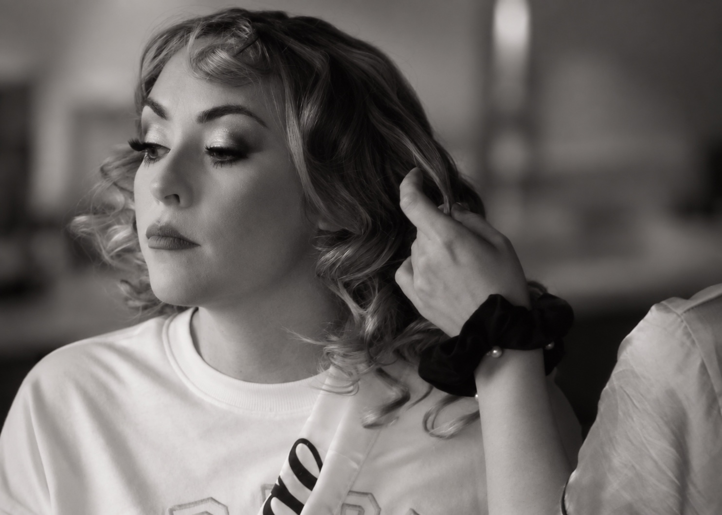 Black and white bridal hair preparation by Capuano Bridal